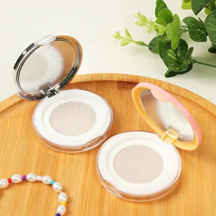 Boîte à poudre portable avec bouffée