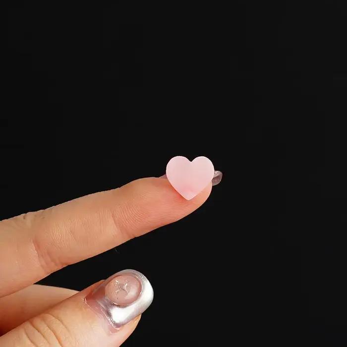 Autocollants de boutons colorés en forme d'étoile pour femmes