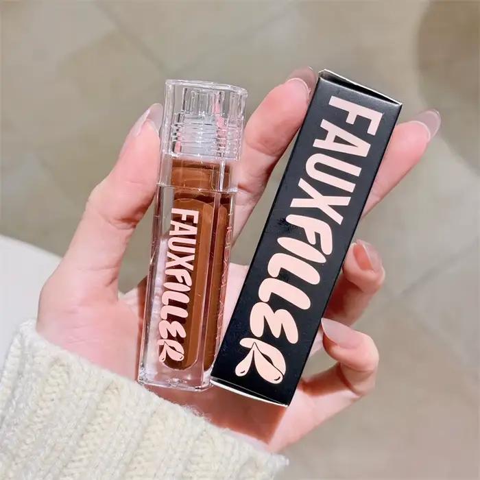 Huda Beauty Faux remplissage brillant Non collant brillant à lèvres hydratant cristal clair huile pour les lèvres repulpant hydratant teinté rouge à lèvres maquillage