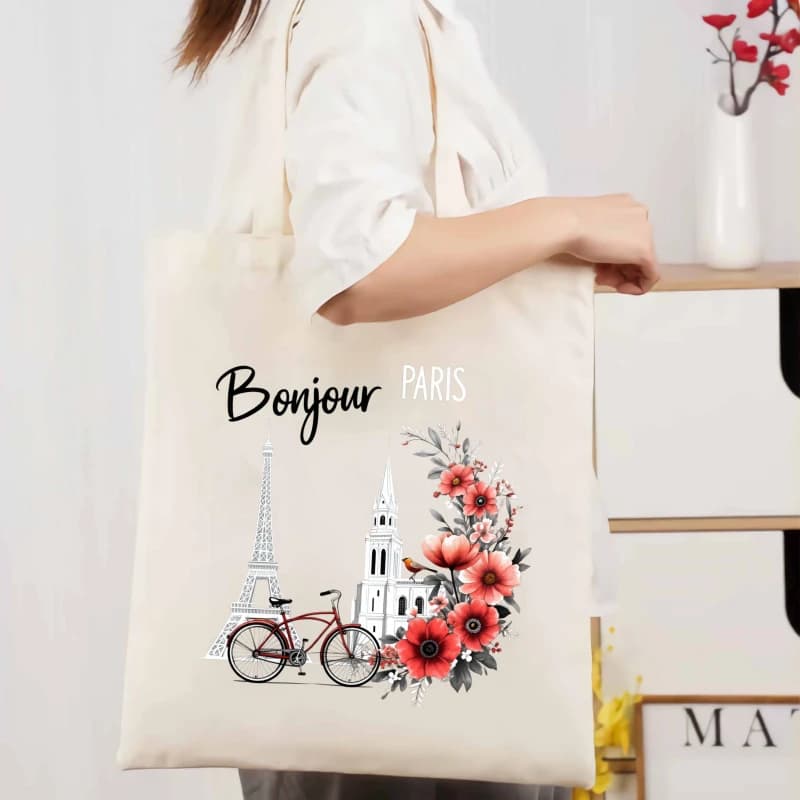 Sac fourre-tout en toile crème, Tour Eiffel de Paris, églises, vélos, fleurs et texte "Bonjour" pour