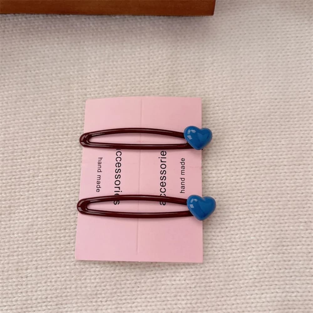 Une paire de pinces à cheveux cœur Y2K style mignon et doux, décorées de cœurs, pour étudiants, pinc