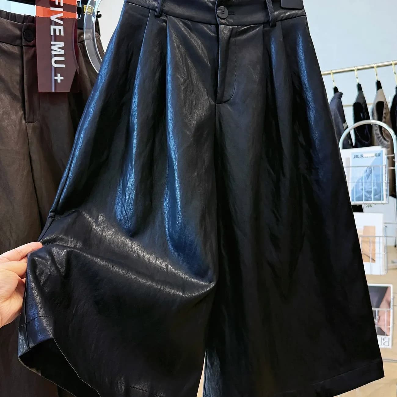 Mode haut de gamme taille élastique a-ligne ample pantalon à jambes larges pour les femmes 2025 auto