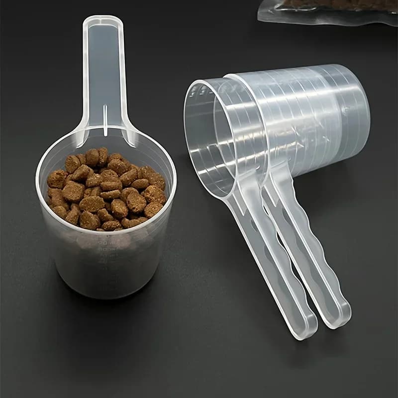 Cuillère à mesurer transparente pour animaux de compagnie, avec échelle, pelle d'alimentation en plastique pour chien et chat, fournitures de table pour animaux de compagnie, 50g 100ml, 1 pièce